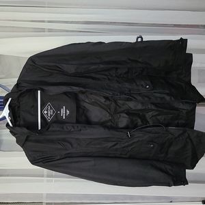 St. John's Bay packable water resistant hooded wind breaker.